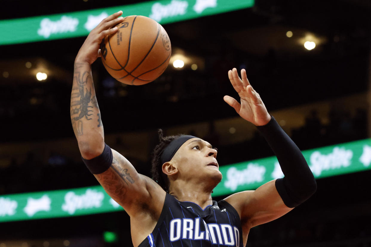 Orlando Magic forward Paolo Banchero goes up for a slam dunk abasing the Atlanta Hawks during the second half of an NBA basketball game Friday, Oct. 21, 2022, in Atlanta. (AP Photo/Butch Dill)