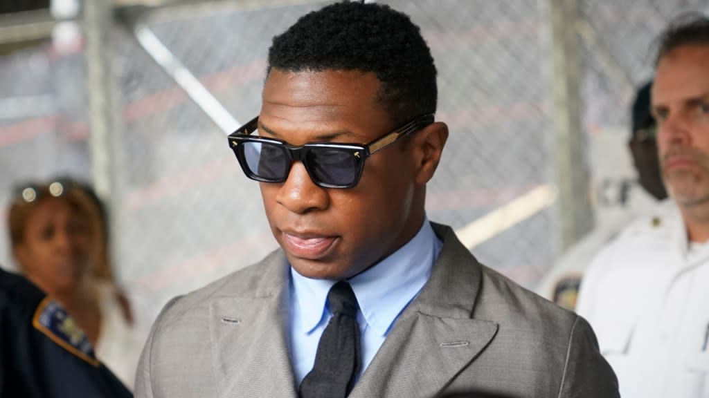 Jonathan Majors leaves court Thursday after a hearing on the actor’s domestic violence case in New York. (Photo: John Minchillo/AP)