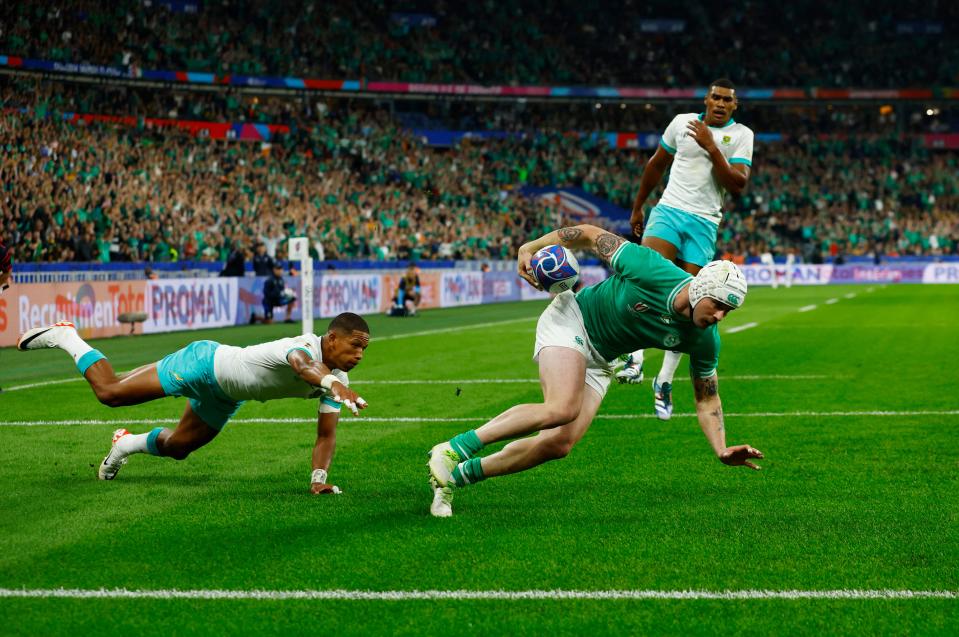 Mack Hansen scores Ireland’s first-half try (Reuters)