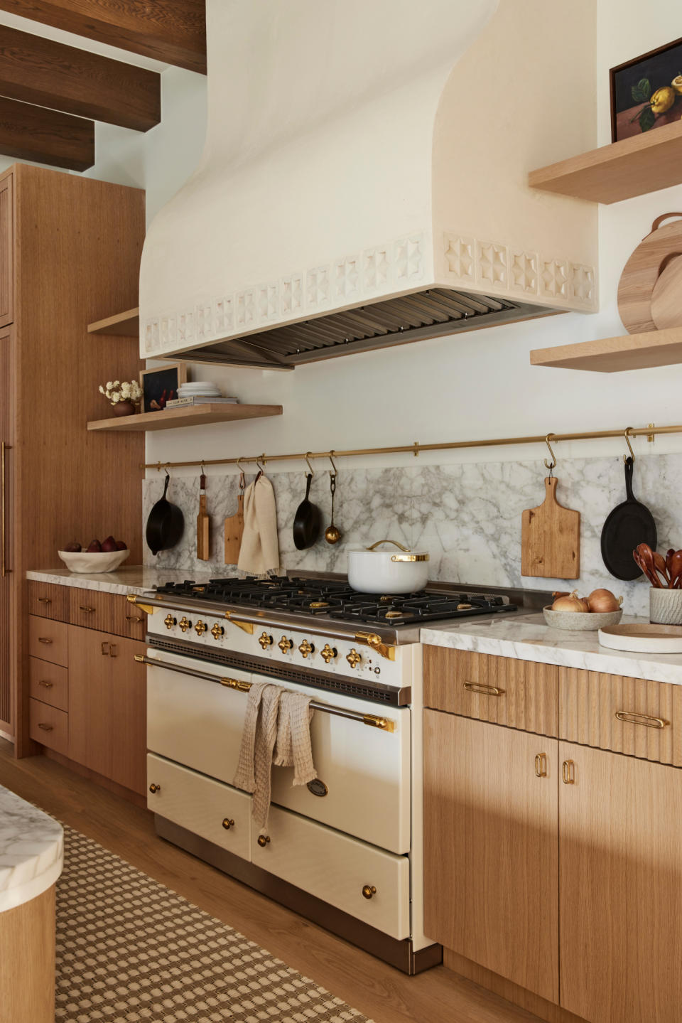 Kitchen with white marble countertop and splashback