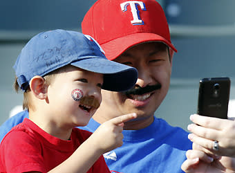 For better or worse, Derek Holland's mustache has become all the rage with Rangers fans