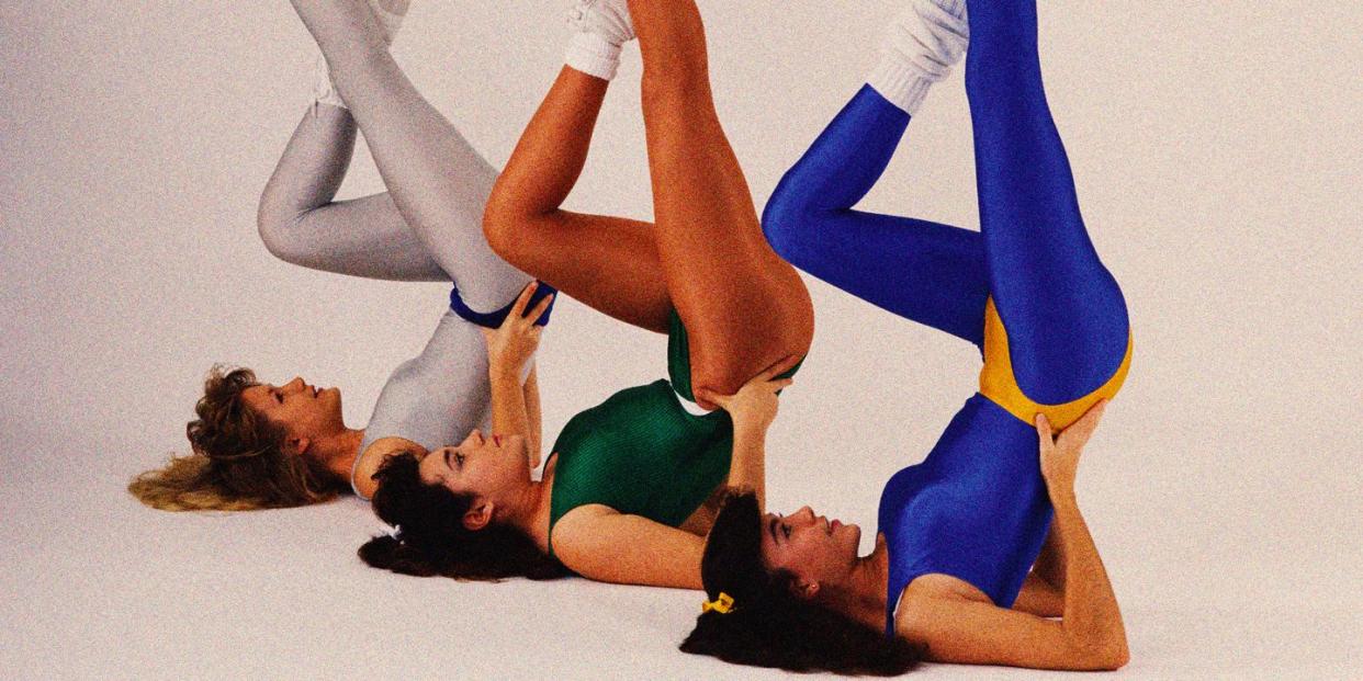 three women in 80s style lycra exercising