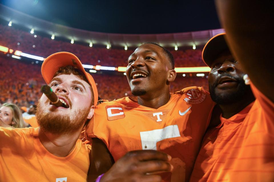Tennessee quarterback Hendon Hooker (5) celebrates with fans after Tennessee's 52-49 win over Alabama in Neyland Stadium, on Saturday, Oct. 15, 2022.