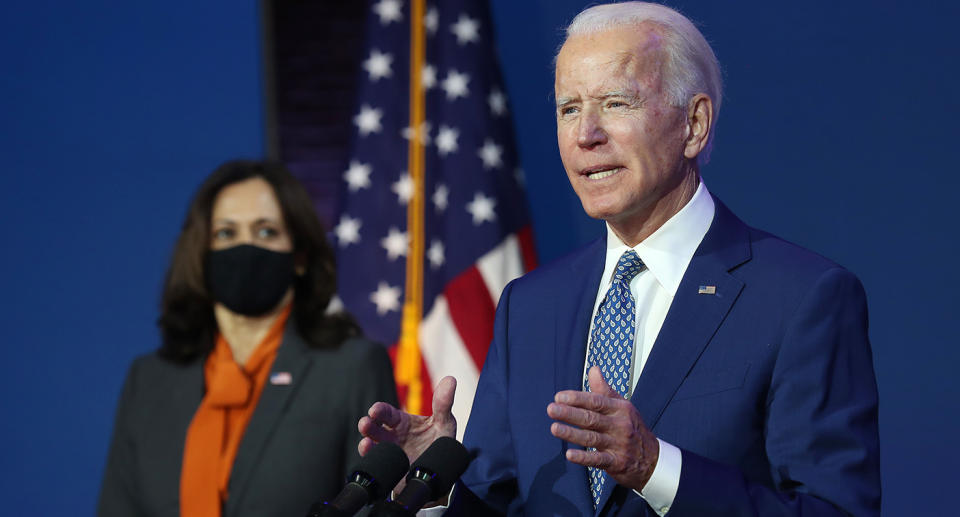 WILMINGTON, DELAWARE - NOVEMBER 09:  U.S. President-elect Joe Biden speaks to the media while flanked by Vice President-elect Kamala Harris, at the Queen Theater after receiving a briefing from the transition COVID-19 advisory board on November 09, 2020 in Wilmington, Delaware. Mr. Biden spoke about how his administration would respond to the coronavirus pandemic. (Photo by Joe Raedle/Getty Images)