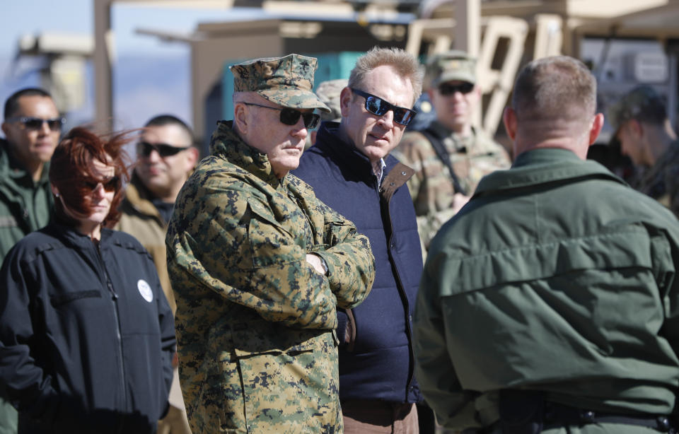 Acting Secretary of Defense Patrick Shanahan, center, and Joint Chiefs Chairman Gen. Joseph Dunford, left, tour the US-Mexico border at Santa Teresa Station in Sunland Park, N.M., Saturday, Feb. 23, 2019. Top defense officials toured sections of the U.S.-Mexico border Saturday to see how the military could reinforce efforts to block drug smuggling and other illegal activity, as the Pentagon weighs diverting billions of dollars for President Donald Trump's border wall. (AP Photo/Pablo Martinez Monsivais)