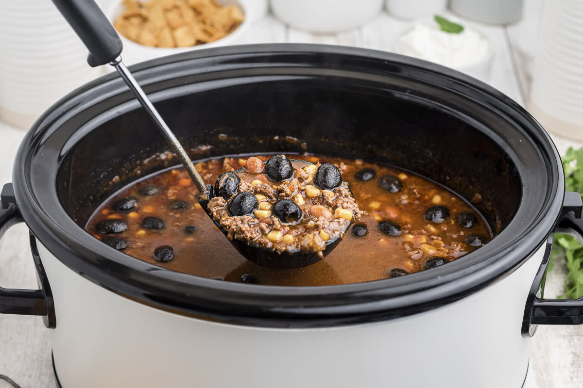 <p>The Magical Slow Cooker</p><p>Beef, corn, olives, tomatoes and ranch mix flavor this easy taco soup.</p><p><strong>Get the Recipe: <a href="https://www.themagicalslowcooker.com/slow-cooker-taco-soup/" rel="nofollow noopener" target="_blank" data-ylk="slk:Crock Pot Ranch Taco Soup;elm:context_link;itc:0;sec:content-canvas" class="link rapid-noclick-resp">Crock Pot Ranch Taco Soup</a></strong></p>