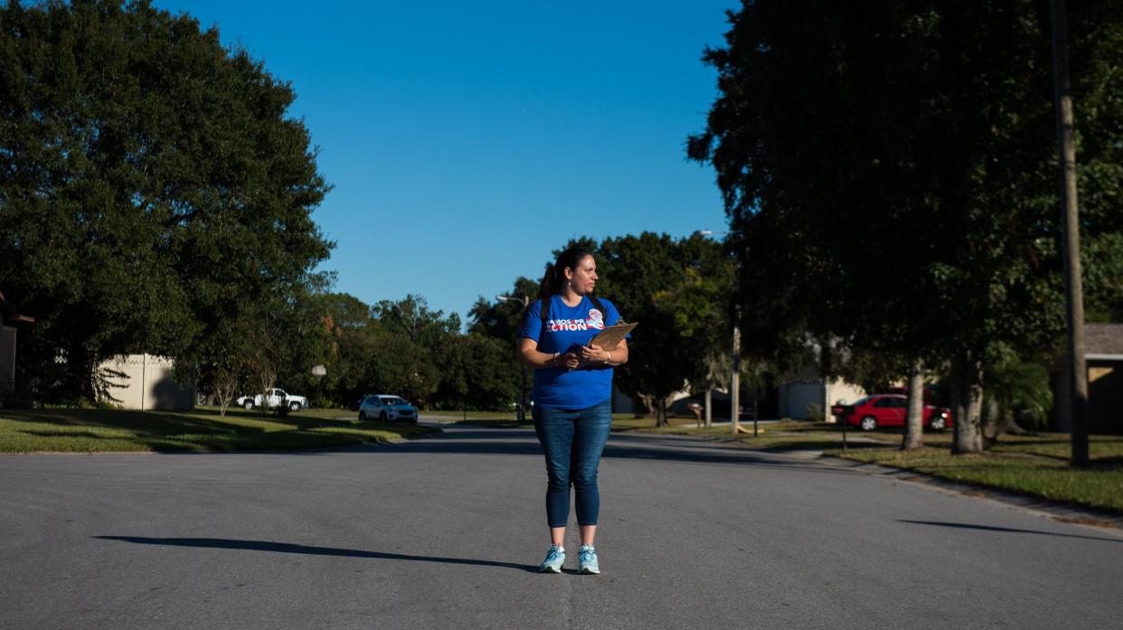 Arleen Sevilla poses for a photo while canvassing in the Chickasaw Woods subdivision in Orlando, Florida, on Oct. 30, 2018. (Photo: Chris McGonigal/HuffPost)