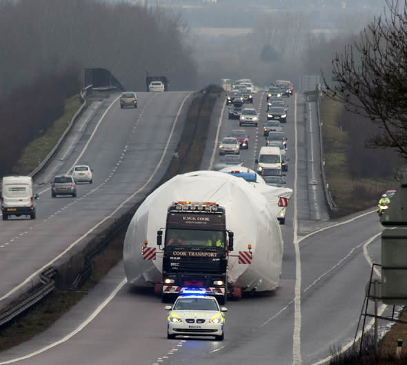 Mandatory Credit: Photo by CALYX/REX (4432821d) Front section and cockpit of a Boeing 747 on the motorway Transportation of a Front section and cockpit of a Boeing 747 Jumbo jet, Swindon, Britain - 14 Feb 2015 The Front section and cockpit of a Boeing 747 Jumbo jet is is moved down the A419 near Swindon's M4  Junction 15. on it's way Hereford from the Cotswold Airport at Kemble Gloucestershire. 