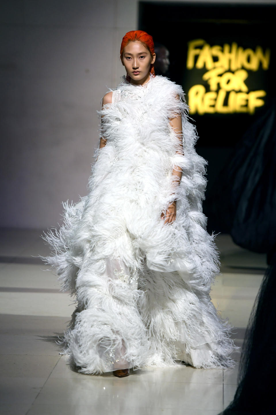 A model walks the runway at the Spring Summer 2020 Fashion For Relief show during London Fashion Week [Photo: Getty Images]