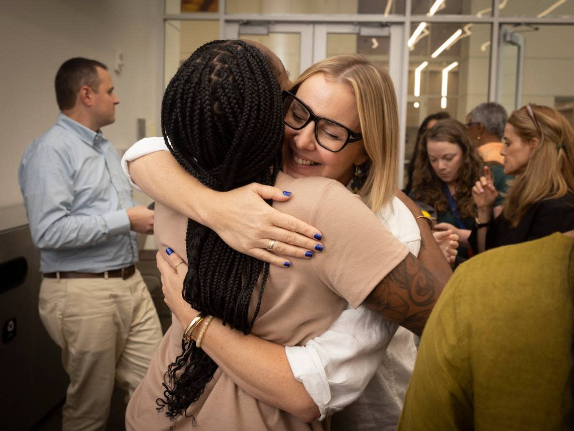 Lauren Jones, from the Elevate Prize Foundation, hugs her co-worker after the team gave away an award during the Give Miami Day fundraising event hosted by The Miami Foundation on Thursday, Nov. 16, 2023, held at Miami Dade College Medical Campus. “I want to feel proud of my city, I feel proud of my city today,” said Miami Foundation CEO Rebecca Fishman Lipsey. Alie Skowronski/askowronski@miamiherald.com