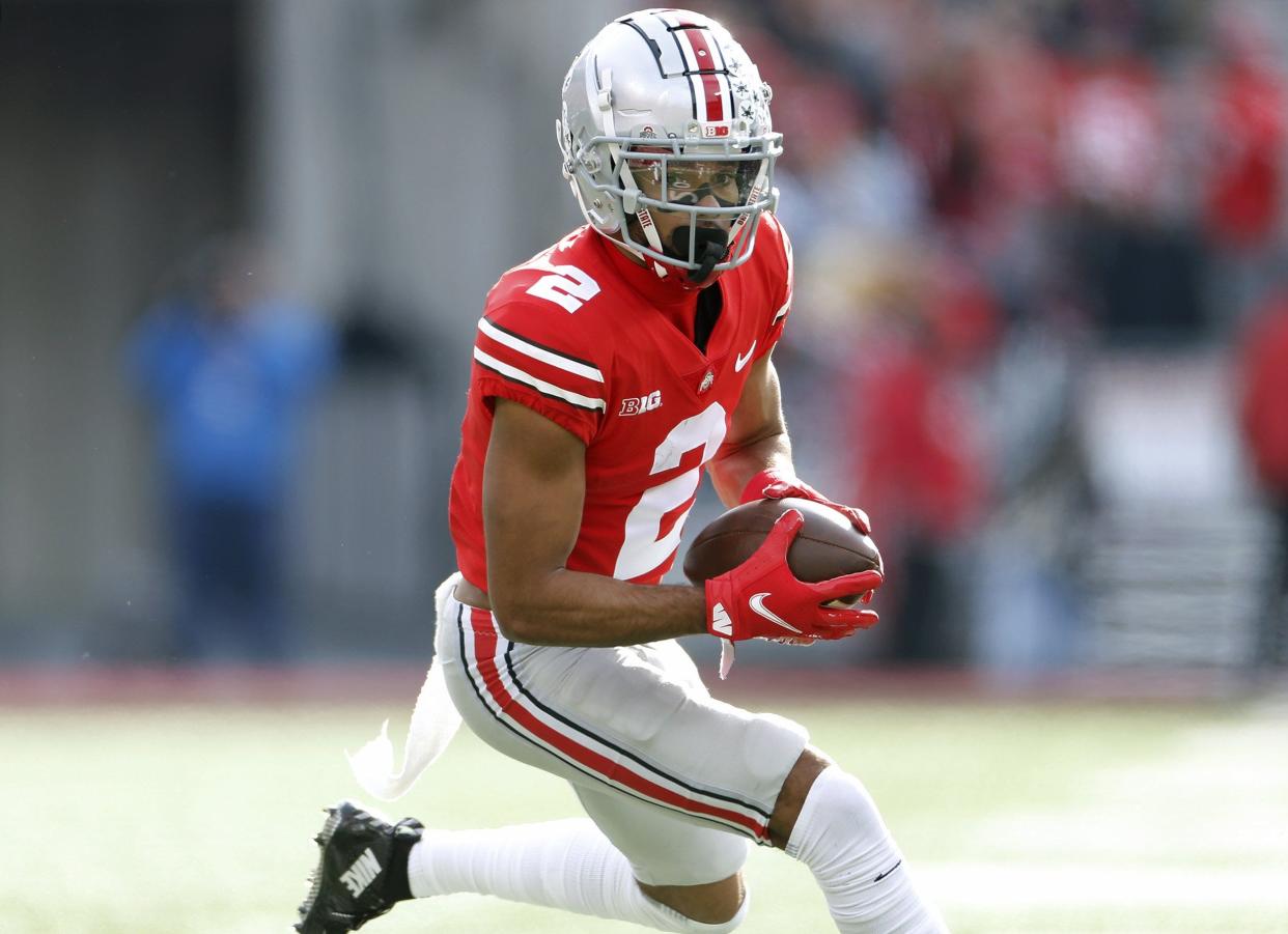 Ohio State Buckeyes wide receiver Chris Olave (2) makes a catch against Michigan State Spartans in the second quarter during their NCAA College football game at Ohio Stadium in Columbus, Ohio on November 20, 2021. 