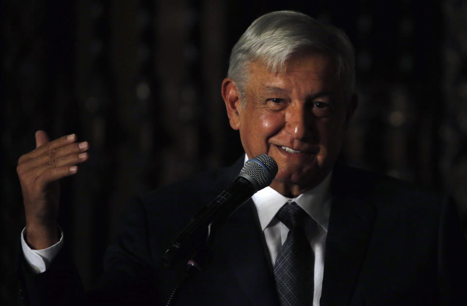 Mexico's President-elect Andres Manuel Lopez Obrador speaks to reporters after meeting with Mexico's President Enrique Pena Nieto at the National Palace in Mexico City, Thursday, Aug. 9, 2018. The leftist candidate, who won in his third try for the presidency with a resounding 53 percent of the vote, will take office on Dec. 1. (AP Photo/Marco Ugarte)