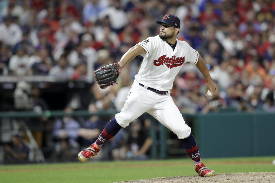 American League pitcher Brad Hand, of the Cleveland Indians, throws during the eighth inning of the MLB baseball All-Star Game against the National League, Tuesday, July 9, 2019, in Cleveland. (AP Photo/Tony Dejak)