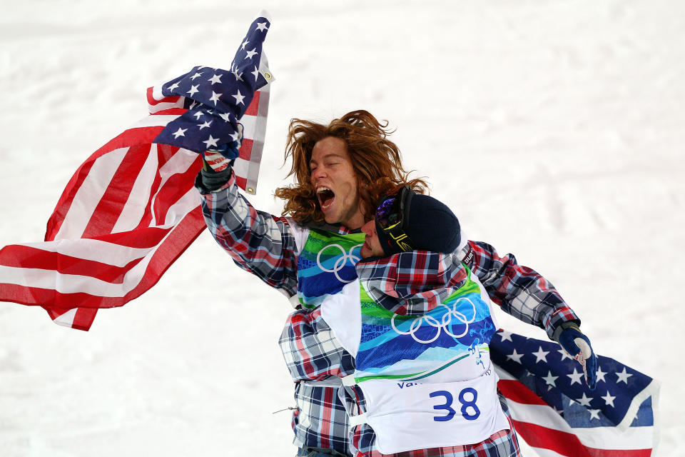 <p>Shaun White of the United States reacts with fellow American Scott Lago after White wins the gold medal and Lago the bronze in the Snowboard Men’s Halfpipe final on day six of the Vancouver 2010 Winter Olympics at Cypress Snowboard & Ski-Cross Stadium on February 17, 2010 in Vancouver, Canada. White won the gold medal with a score in his previous run. (Photo by Cameron Spencer/Getty Images) </p>