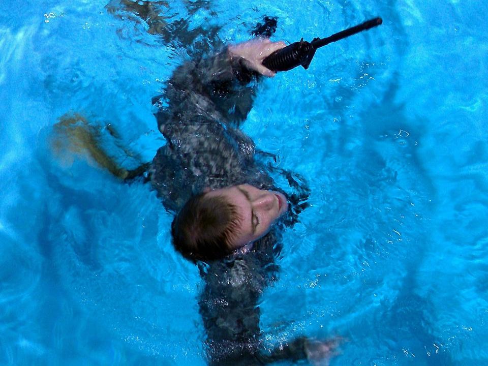 Army National Guard soldier swimming