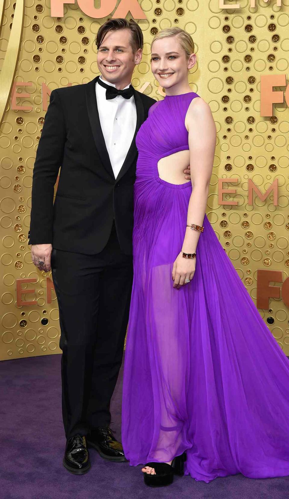 Mark Foster and Julia Garner attend the 71st Emmy Awards at Microsoft Theater on September 22, 2019 in Los Angeles, California