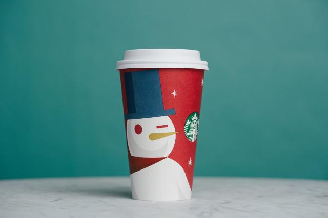 After last year's drama, Starbucks unveils holiday cups designed by 13  women