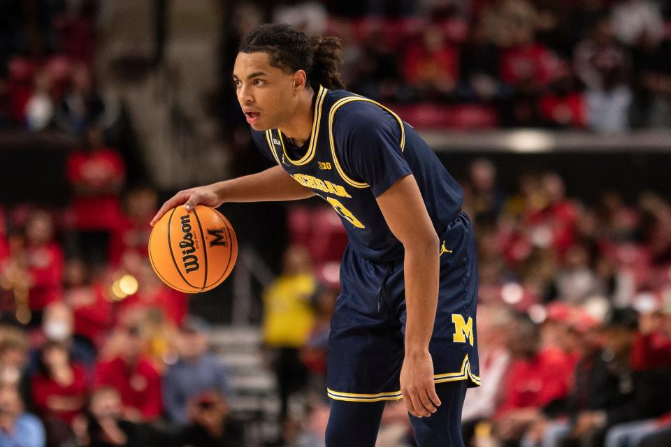 Michigan Wolverines guard Jett Howard (13) looks to pass during the first half against the Maryland Terrapins  at Xfinity Center.