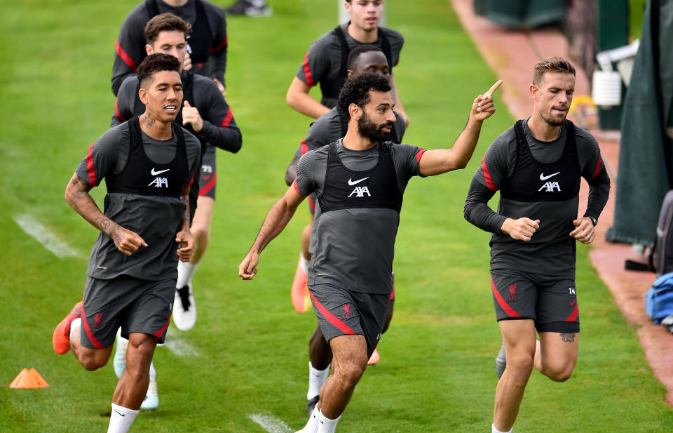 LIVERPOOL, ENGLAND - SEPTEMBER 08: (THE SUN OUT, THE SUN ON SUNDAY OUT) Roberto Firmino, Mohamed Salah and Jordan Henderson captain of Liverpool during a training session at Melwood Training Ground on September 08, 2020 in Liverpool, England. (Photo by Andrew Powell/Liverpool FC via Getty Images)