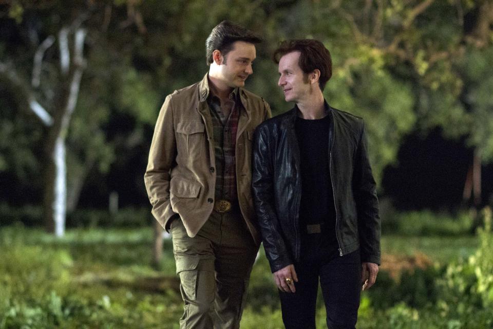 This image released by HBO shows Michael McMillian, left, and Denis O'Hare in a scene from "True Blood." The 17th annual "Where We Are on TV" report released Friday by the Gay & Lesbian Alliance Against Defamation (GLAAD) found that 4.4 percent of actors appearing regularly on prime-time network drama and comedy series during the 2012-13 season will portray lesbian, gay, bisexual or transgender (LGBT) characters. This is up from 2.9 percent in 2011, which saw a dip in what had been a growing trend. The HBO drama "True Blood" remains the most inclusive series on cable television, featuring six LGBT characters. (AP Photo/HBO, John P. Johnson)