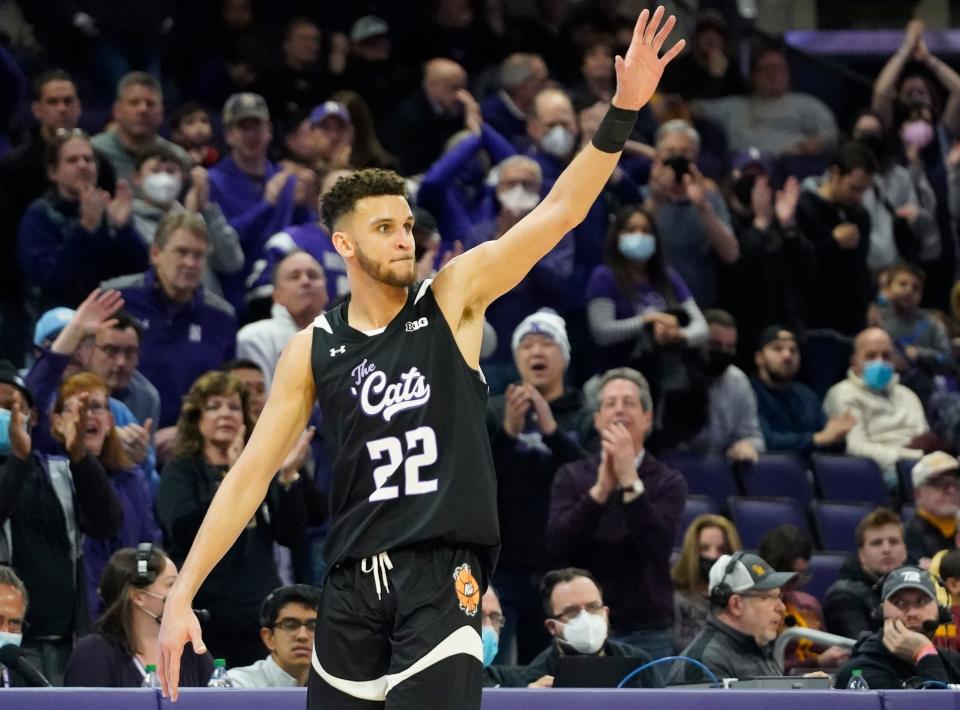 Northwestern forward Pete Nance waves to the crowd after his final home game at Welsh-Ryan Arena, a victory over Minnesota in March. Nance, a Revere High School graduate, entered the transfer portal and will play his final collegiate season at North Carolina.