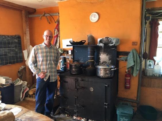 Lea Trainer in the communal farm house kitchen – complete with wood-burning oven (Colin Drury)