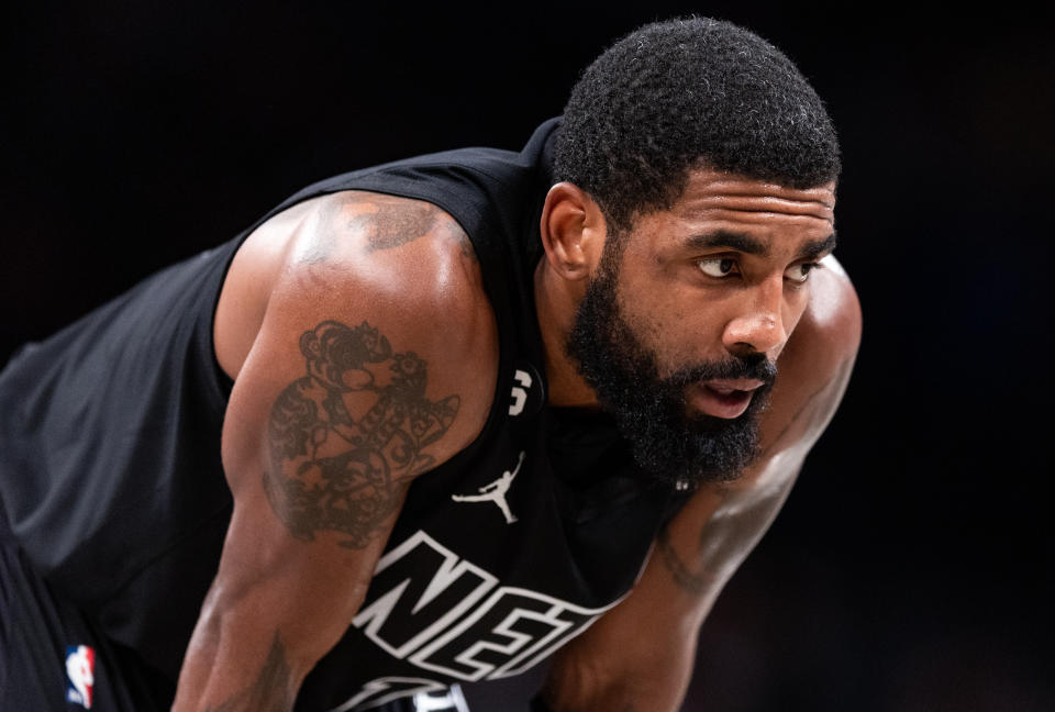 NEW YORK, NEW YORK - OCTOBER 31: Kyrie Irving #11 of the Brooklyn Nets looks on during a break in the action during the third quarter of the game against the Indiana Pacers at Barclays Center on October 31, 2022 in New York City. NOTE TO USER: User expressly acknowledges and agrees that, by downloading and or using this photograph, User is consenting to the terms and conditions of the Getty Images License Agreement. (Photo by Dustin Satloff/Getty Images)