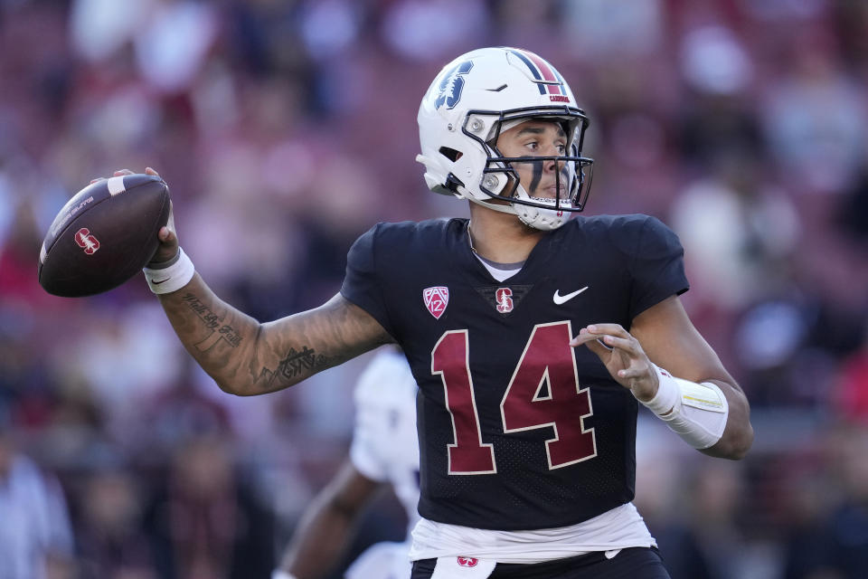 Stanford quarterback Ashton Daniels (14) passes against Washington during the first half of an NCAA college football game in Stanford, Calif., Saturday, Oct. 28, 2023. (AP Photo/Jeff Chiu)