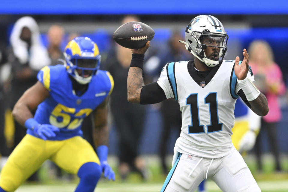 Carolina Panthers quarterback PJ Walker (11) throws against the Los Angeles Rams during the first half of an NFL football game Sunday, Oct. 16, 2022, in Inglewood, Calif. (AP Photo/Jayne Kamin-Oncea)