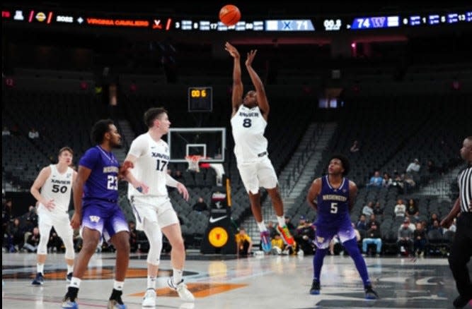 Rice transfer Quincy Olivari sank five 3-pointers over Xavier's two games in the Continental Tire Main Event in Las Vegas, Nevada. He his trio of first-half triples against Saint Mary's helped the Musketeers take a 28-18 lead into the intermission.
