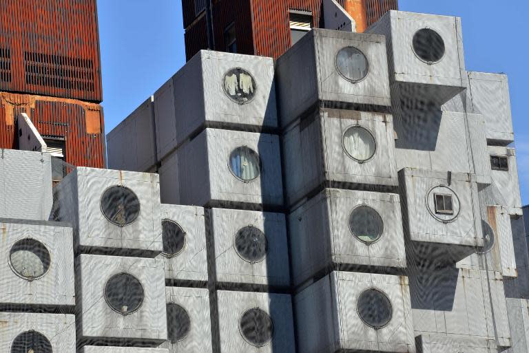 The rooms' large round window and in-built '70s features like retro clocks and sound systems give them the appearance of being suspended in yesteryear's vision of the future