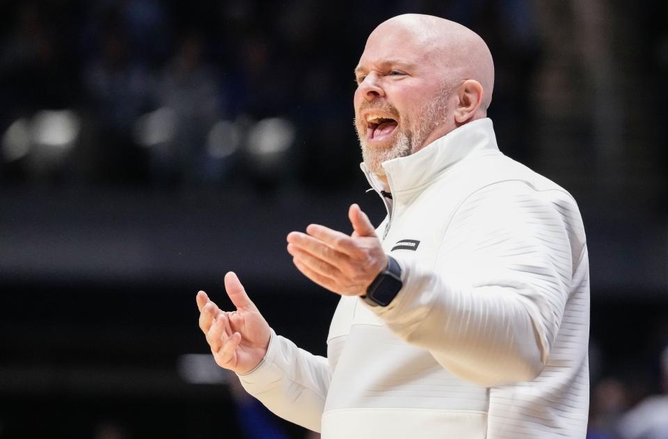 Indiana State Sycamores head coach Josh Schertz yells to players on the court Thursday, April 4, 2024, during the NIT championship game at Hinkle Fieldhouse in Indianapolis.