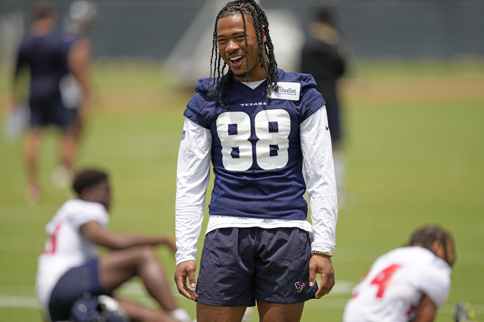 Houston Texans' John Metchie III smiles during an NFL football rookie minicamp practice Friday, May 13, 2022, in Houston. (AP Photo/David J. Phillip)