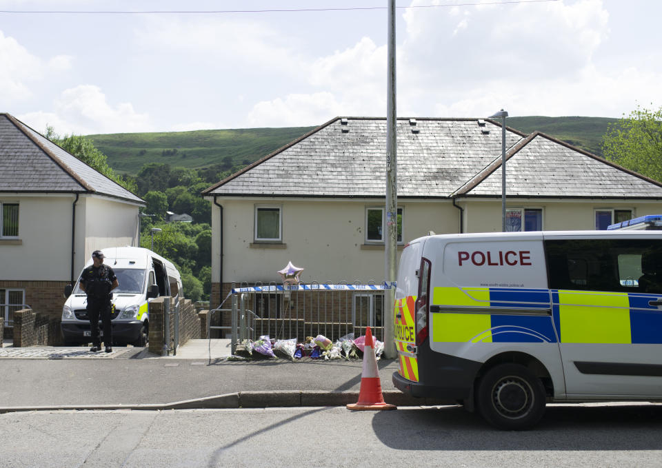 A police van stands outside the property where Amelia Brooke Harris was found dead in June (Getty Images)