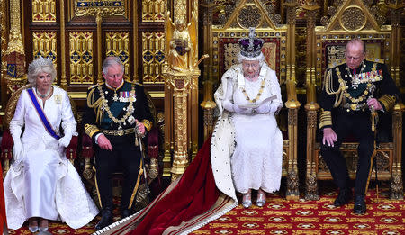 FILE PHOTO: Britain's Queen Elizabeth delivers the Queen's Speech next to Prince Phillip and flanked by Prince Charles and his wife Camilla during the State Opening of Parliament in the Palace of Westminster in London, Britain, May 27, 2015. Ben Stansall/Pool via REUTERS/File Photo