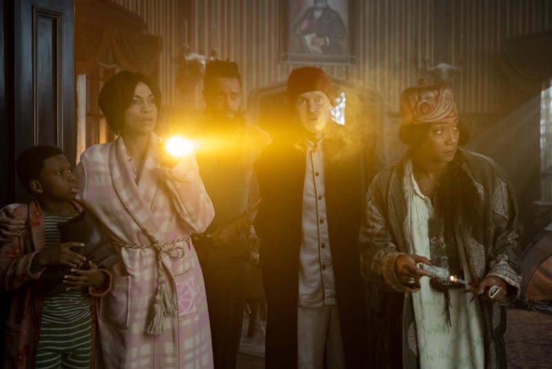 From left to right, Chase W. Dillon, Rosario Dawson, LaKeith Stanfield, Owen Wilson and Tiffany Haddish star in "Haunted Mansion." Photo courtesy of Disney