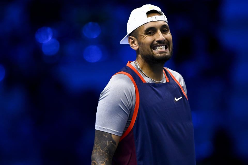 Nick Kyrgios (pictured) reacts during a tennis match.