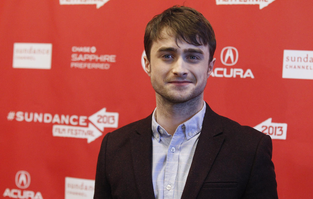 Cast member Daniel Radcliffe poses at the premiere of "Kill Your Darlings" during the Sundance Film Festival in Park City, Utah January 18, 2013. REUTERS/Mario Anzuoni  (UNITED STATES - Tags: ENTERTAINMENT)