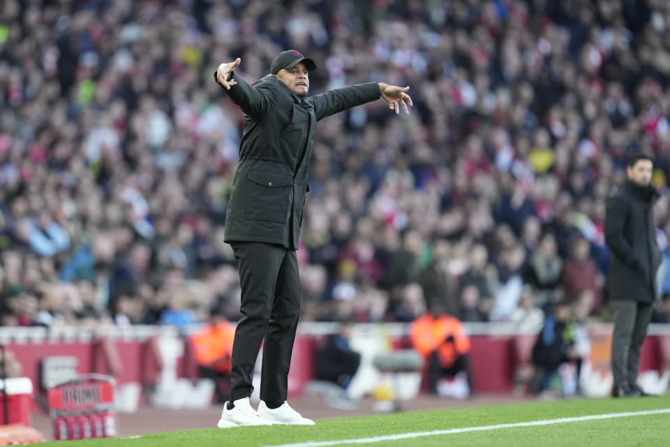 Burnley's head coach Vincent Kompany gestures during the English Premier League soccer match between Arsenal and Burnley at Emirates stadium in London, England, Saturday, Nov. 11, 2023. (AP Photo/Kin Cheung)