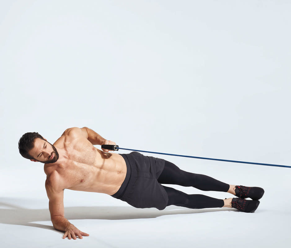 How to do it<ol><li>Start in a right forearm-down side plank, feet stacked, left hand holding a resistance band anchored in front of body.</li><li>Pull left elbow back, then release for one rep.</li><li>Do all reps on the left side, then switch sides.</li></ol>