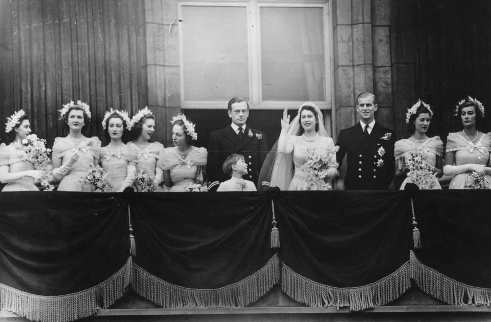 20th November 1947: The royal group on the balcony of Buckingham Palace after returning from the wedding ceremony between Princess Elizabeth and the Duke of Edinburgh at Westminster Abbey. (left to right) Princess Margaret (1930 - 2002), Margaret Elphinstone, Diana Bowes-Lyon, Lady Caroline Montague Douglas-Scott, Lady Elizabeth Lambert, the Marquis of Milford-Haven, Prince William, the bride and groom, Lady Mary Cambridge and Lady Pamela Mountbatten