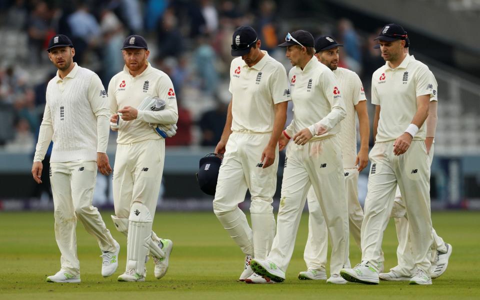 England's players trudge off after a disappointing day with bat and ball - REUTERS