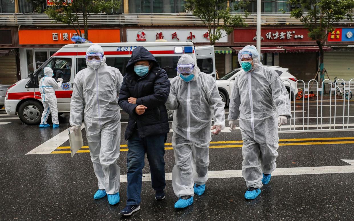 Wuhan has been placed on lockdown by Chinese authorities in a bid to contain the virus - AFP