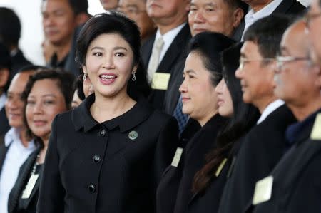 Ousted former Thai prime minister Yingluck Shinawatra smiles as she arrives at the Supreme Court in Bangkok, Thailand July 21, 2017. REUTERS/Chaiwat Subprasom