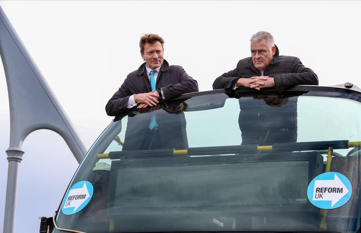 Ashfield, Nottinghamshire, UK. 15th Mar, 2024. Richard Tice (left) and Lee Anderson stand on top of the open-top Reform UK battle bus and speak to supporters below during the Reform UK campaign day. Former Conservative MP, Lee Anderson visits his Ashfield constituency for the first time since defecting to Reform UK on the 11th March 2024 and becoming their first MP. (Credit Image: © Martin Pope/SOPA Images via ZUMA Press Wire) EDITORIAL USAGE ONLY! Not for Commercial USAGE!