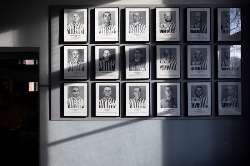 Pictures of prisoners are displayed in the former Nazi German Auschwitz concentration camp complex in Oswiecim