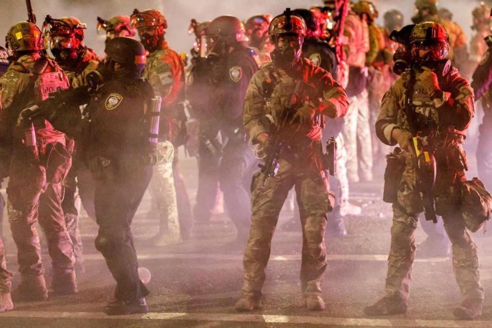 Federal police under the orders of Donald Trump launch teargas after a demonstration in Portland, Oregon, on Thursday.