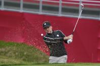 Team Europe's Ian Poulter hits to the ninth green during a practice day at the Ryder Cup at the Whistling Straits Golf Course Thursday, Sept. 23, 2021, in Sheboygan, Wis. (AP Photo/Ashley Landis)