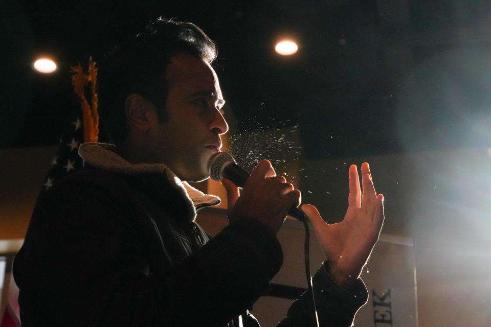 GOP presidential candidate Vivek Ramaswamy speaks to voters at a “Commit to Caucus” rally on Sunday, Jan. 14, 2024, at Grimaldi’s Pizzeria in Ankeny, IA.