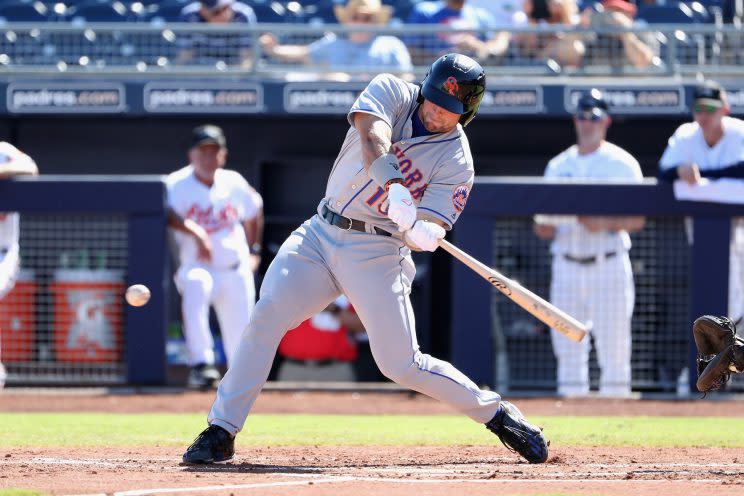 Tim Tebow is getting a baseball card. (Getty Images/Christian Petersen)